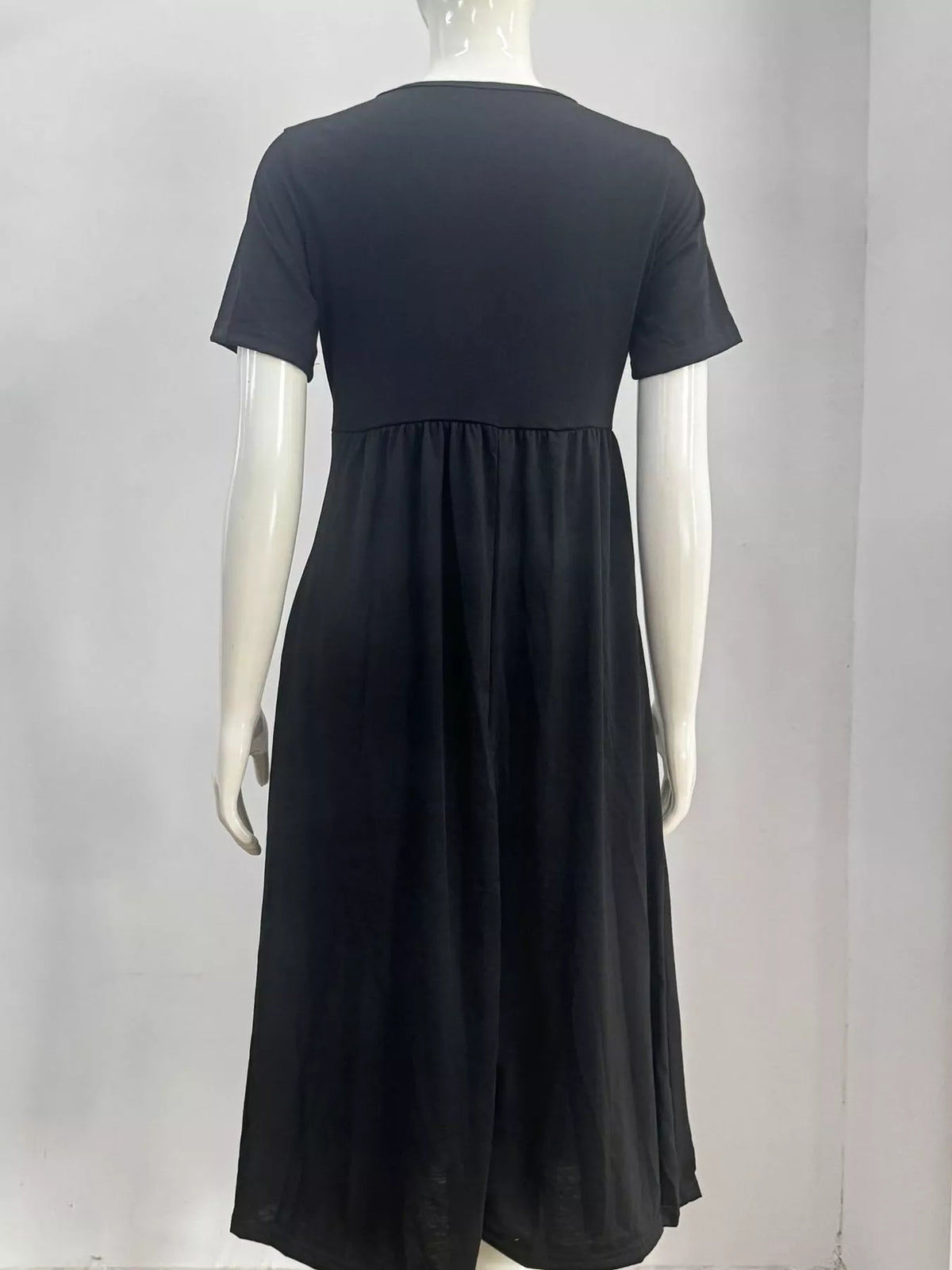 Black crisscross short sleeve midi dress, back view