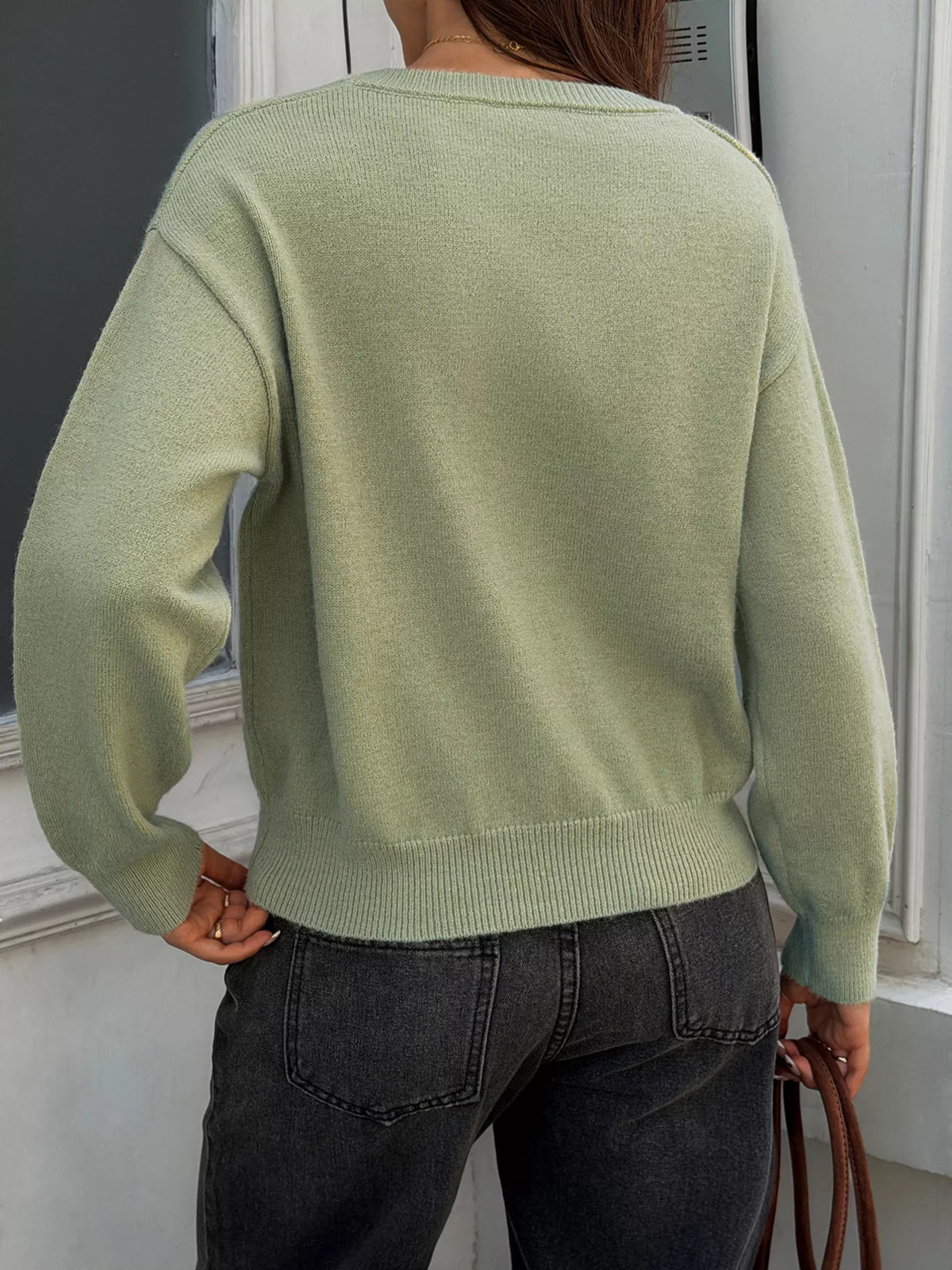 V-neck ribbed hem sweater