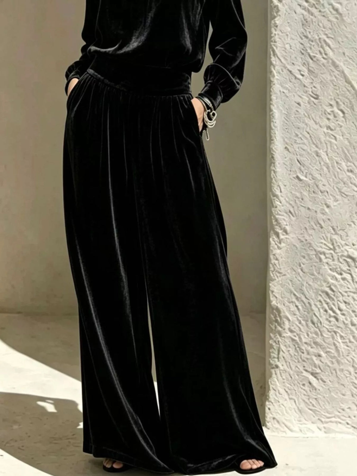 Black velvet mock-neck top and pants set, pants detail