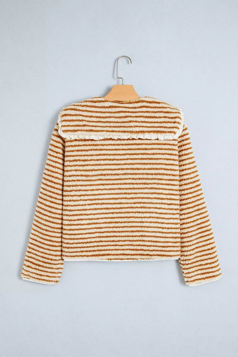 Striped fleece jacket, hanging back
