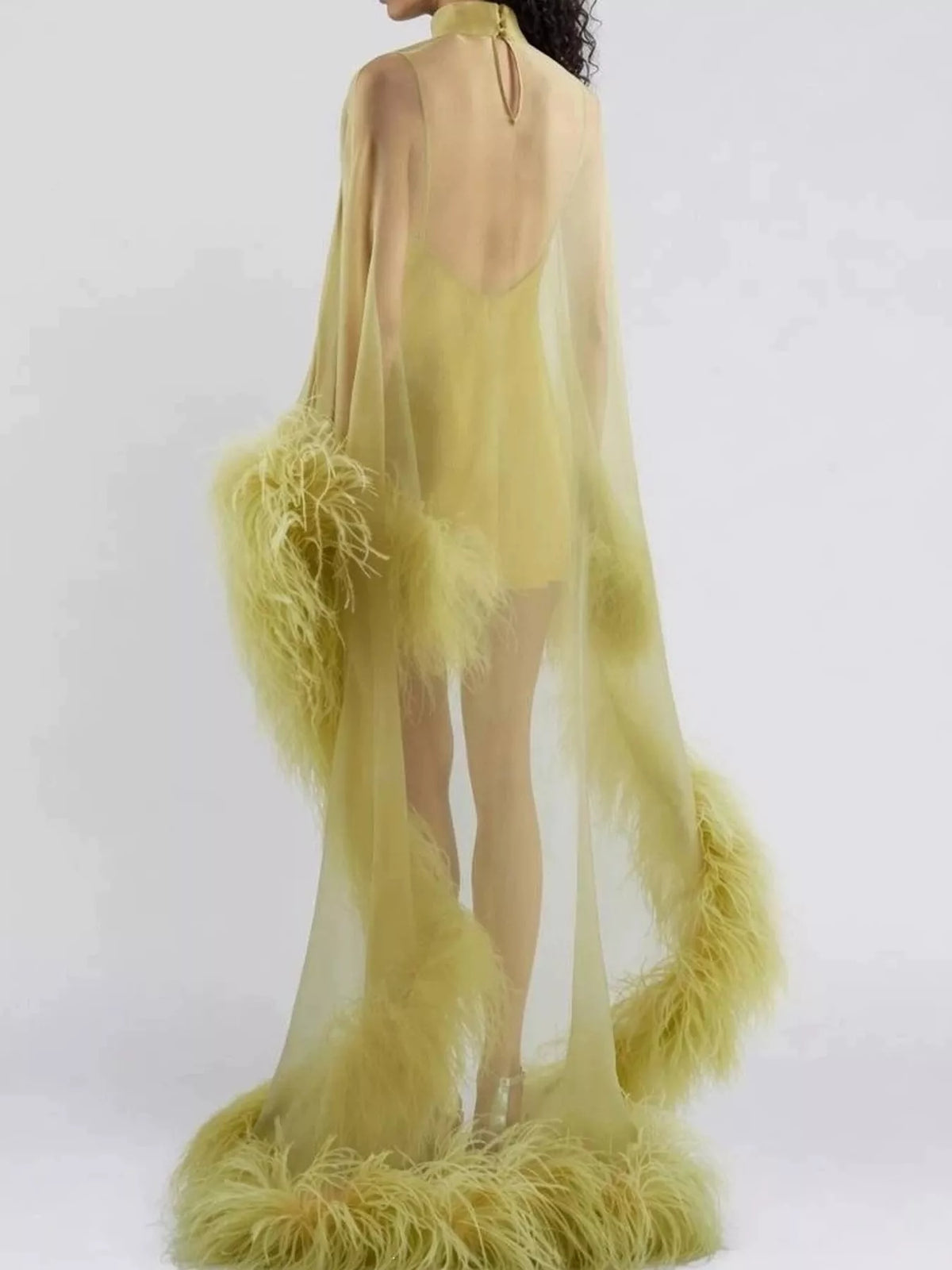 Green feather-trimmed sheer mock neck mini dress, back view
