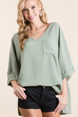 Trendsi BiBi Flowy Woven V-Neck Top with Rolled Up Cuffs -