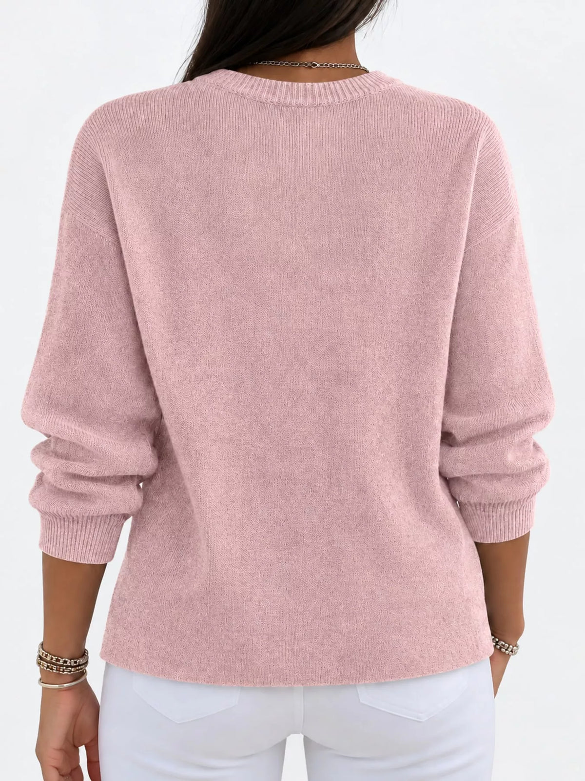 Pink crew neck sweater, back view
