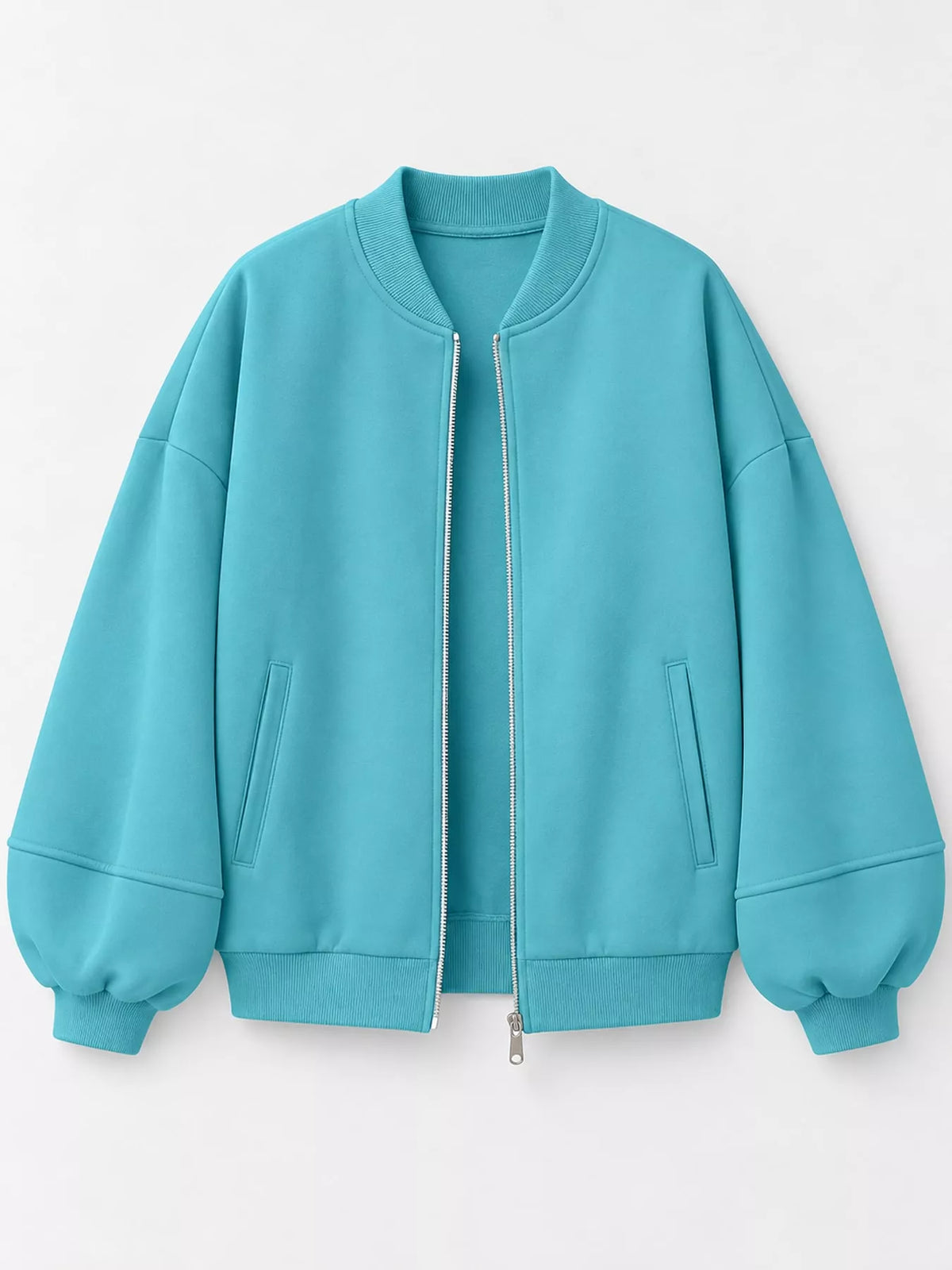Turquoise oversized zip-up jacket — front view