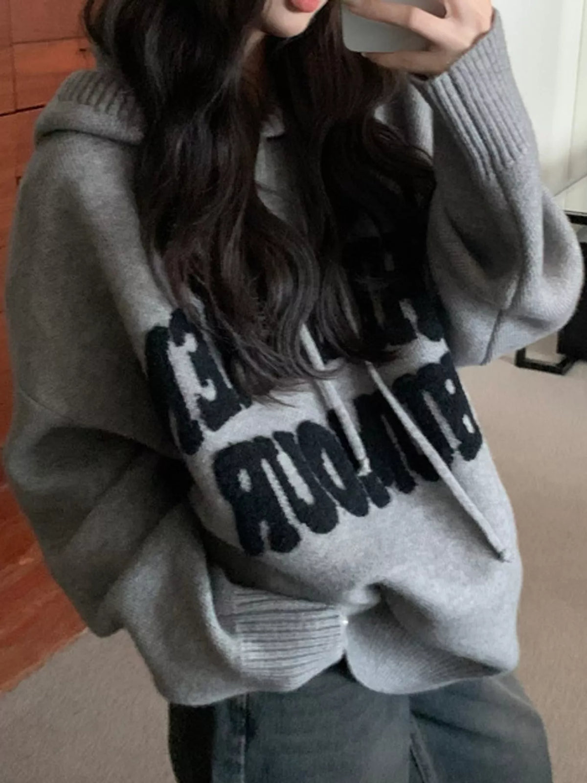 Gray graphic long-sleeve sweater, garment detail