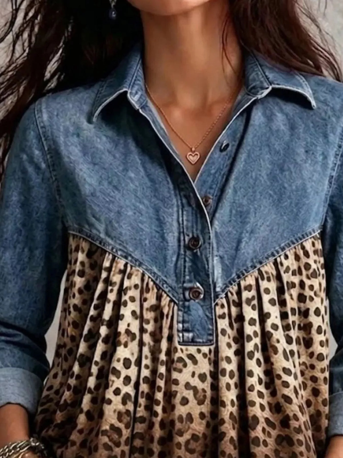Light blue leopard-panel button-front blouse, neckline close-up