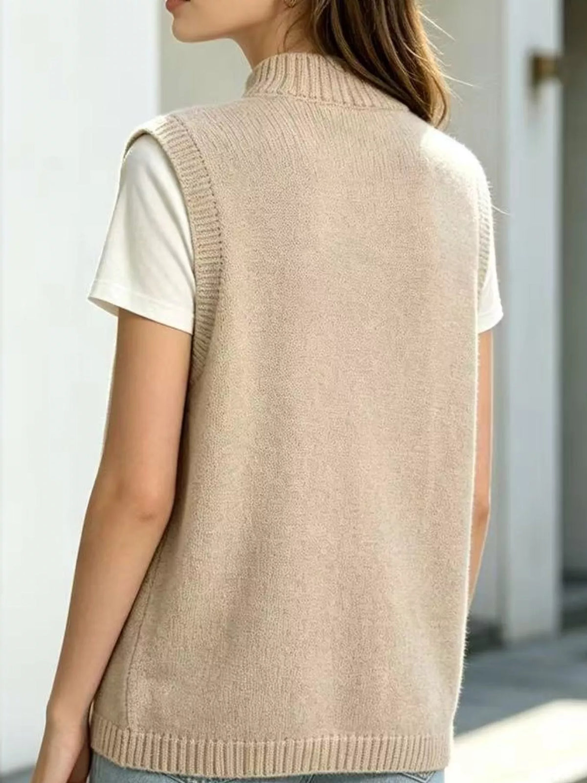 Mock Neck Asymmetrical Hem Knit Sweater Vest, back view in beige