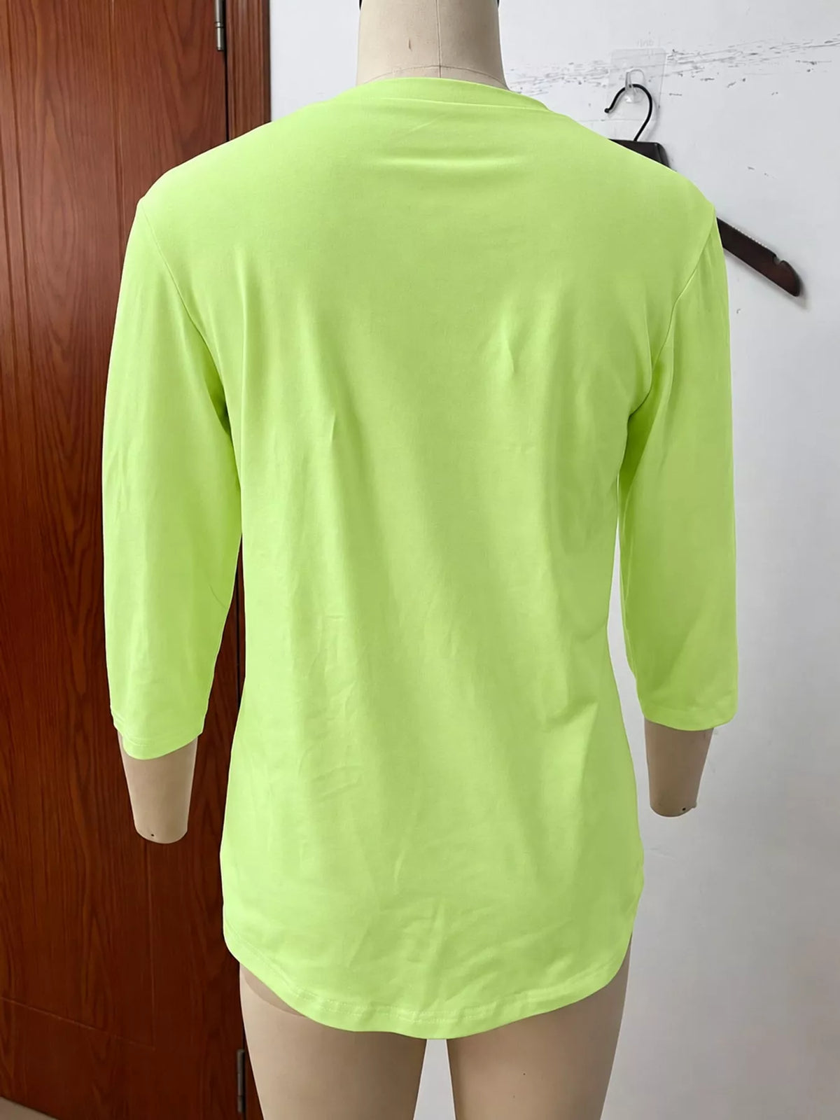 Lime green v-neck half sleeve t-shirt, back view