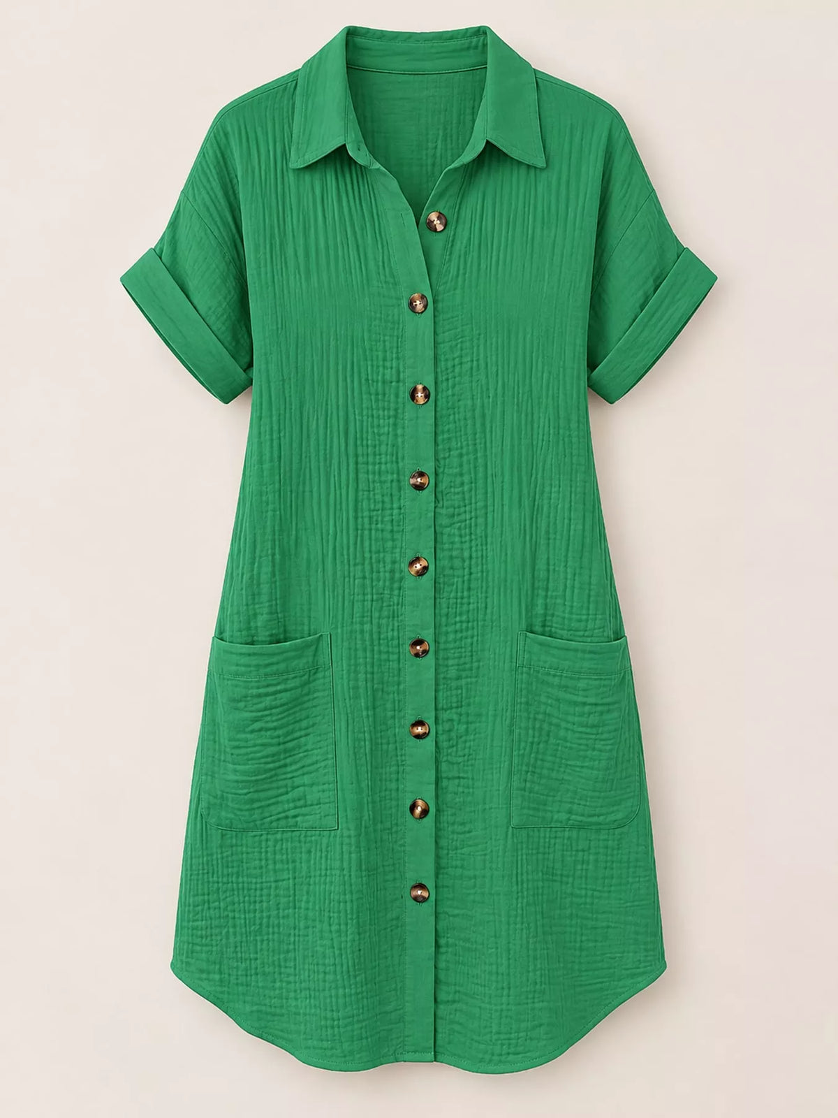 Green textured button-front shirt dress with pockets, on hanger