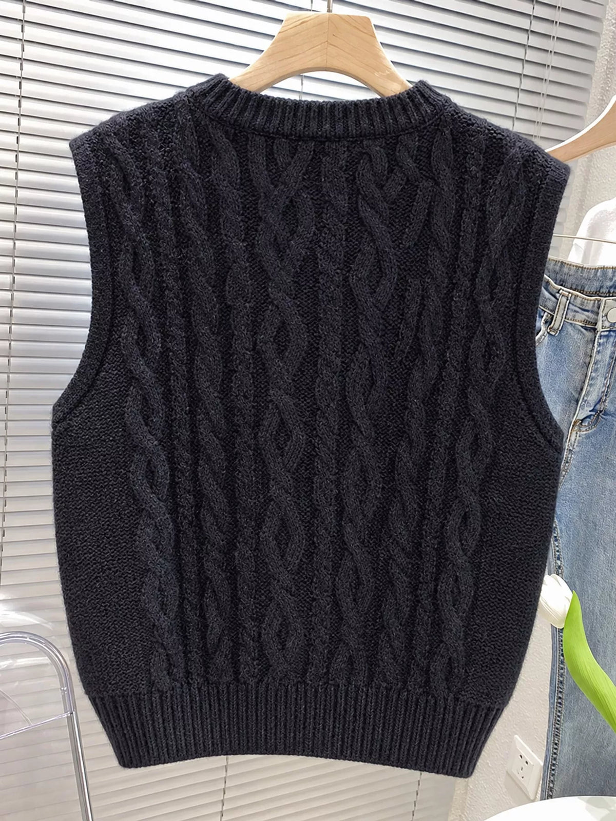 Black cable-knit sweater vest