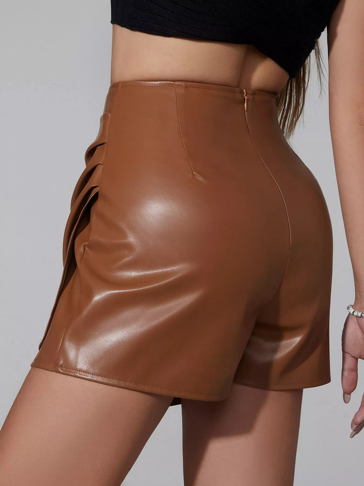 High-Waisted Ruched Faux Leather Skort — back view