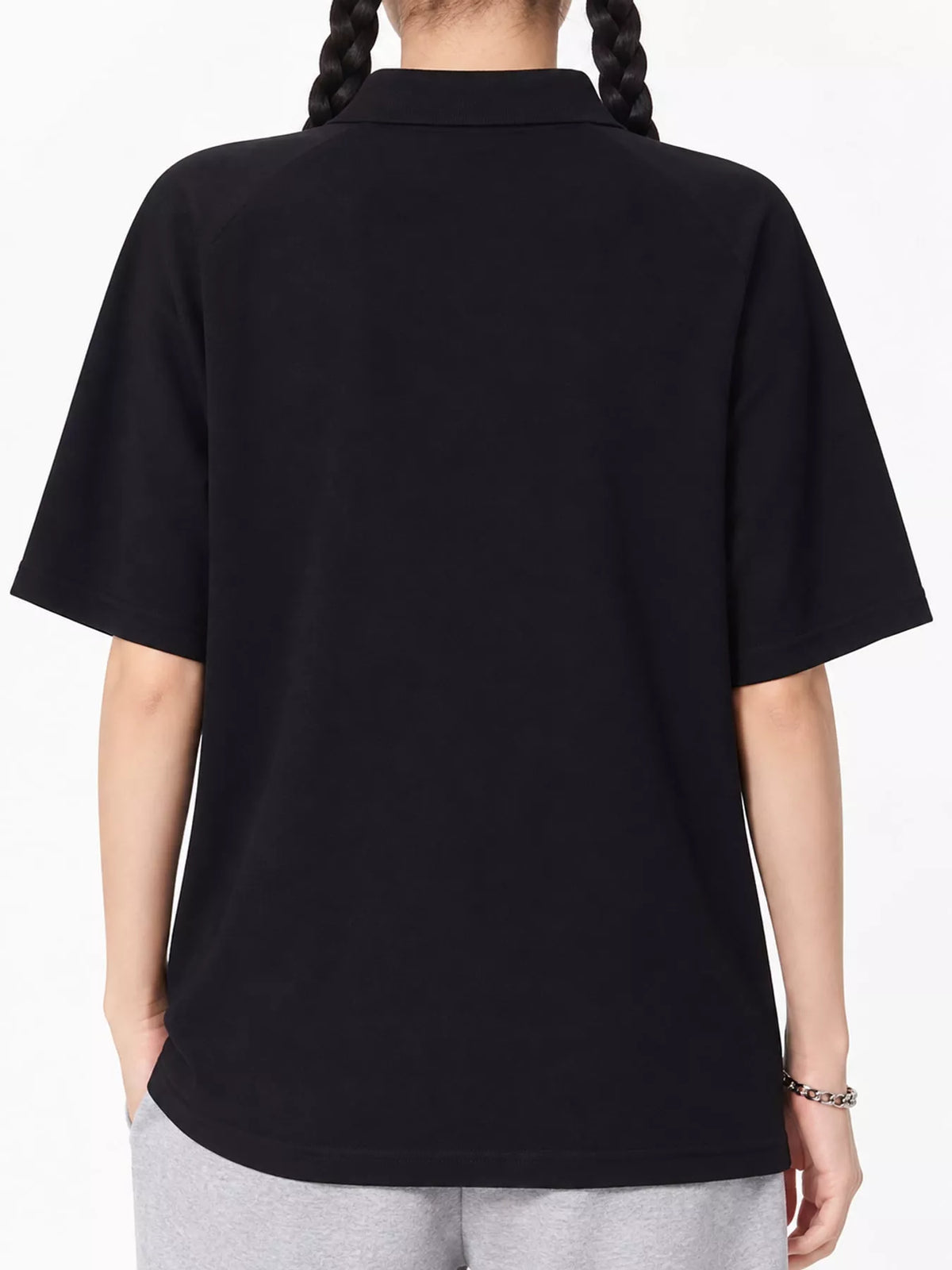 Black short sleeve polo t-shirt, back view
