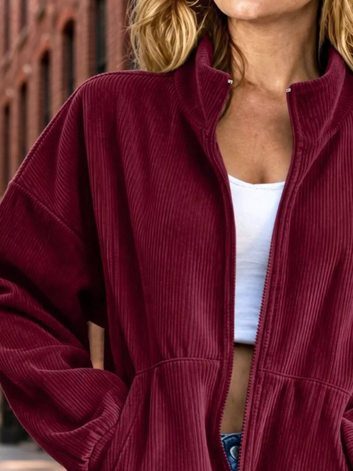 Burgundy corduroy zip-up jacket, collar and zipper detail