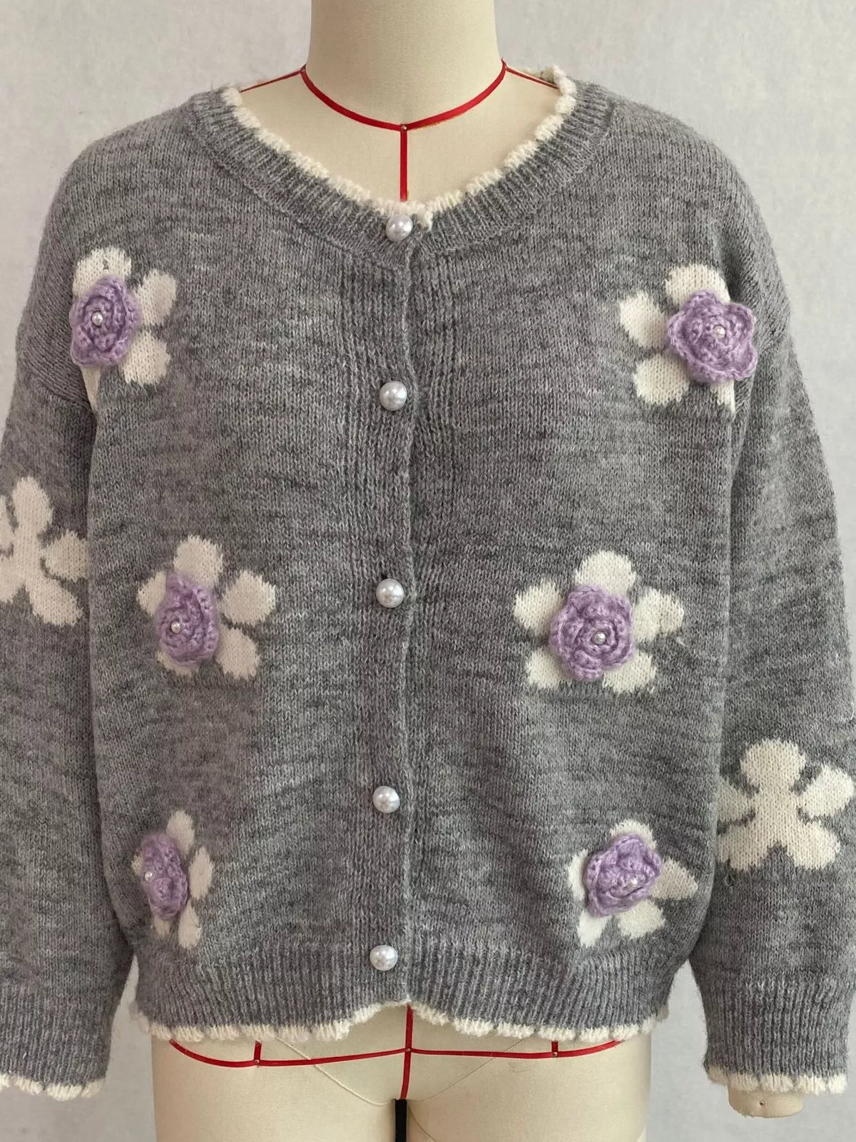 Floral-applique knit cardigan in gray, mannequin front view