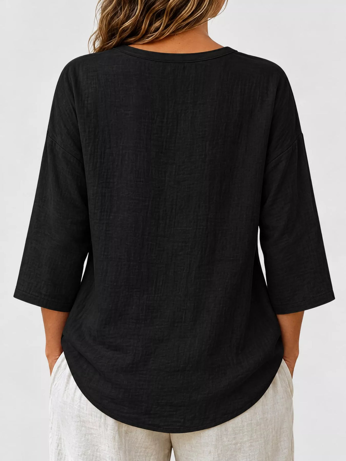 Button Notched 3/4 Sleeve Blouse in black, back view