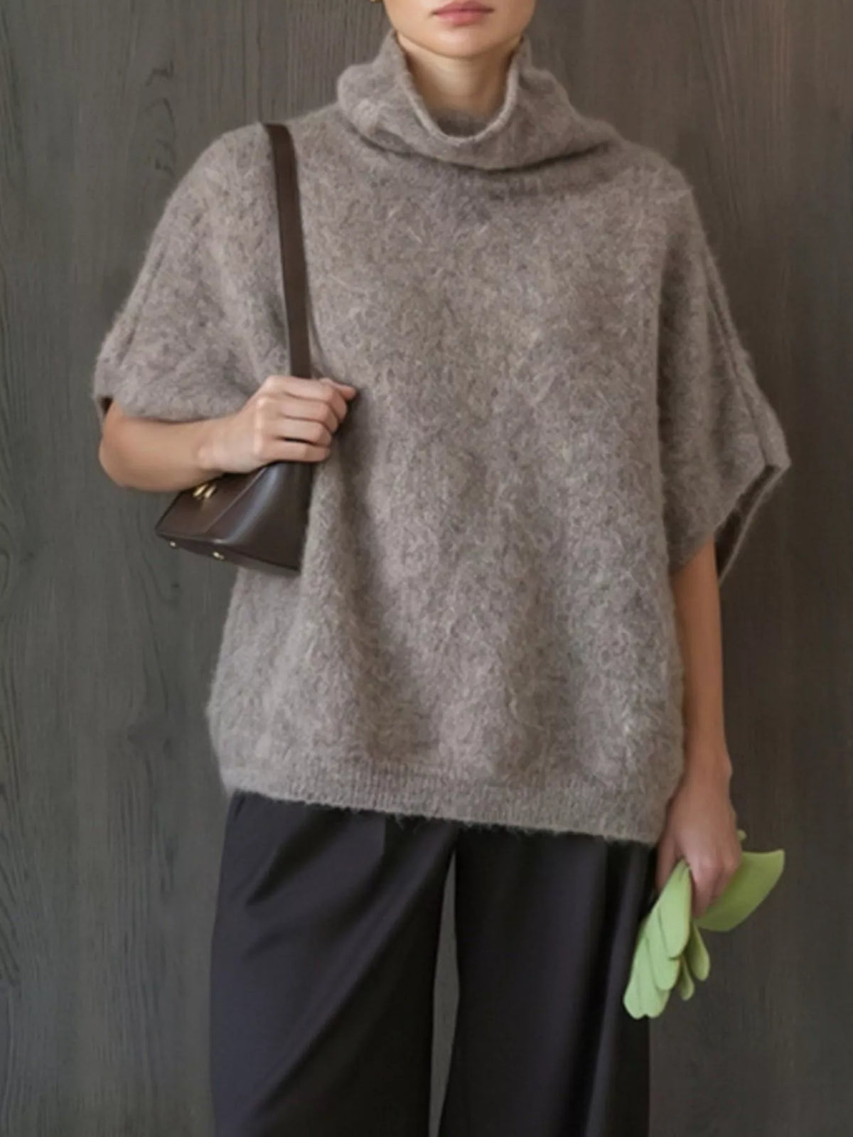 Fuzzy short-sleeve turtleneck sweater in mocha, front view with shoulder bag