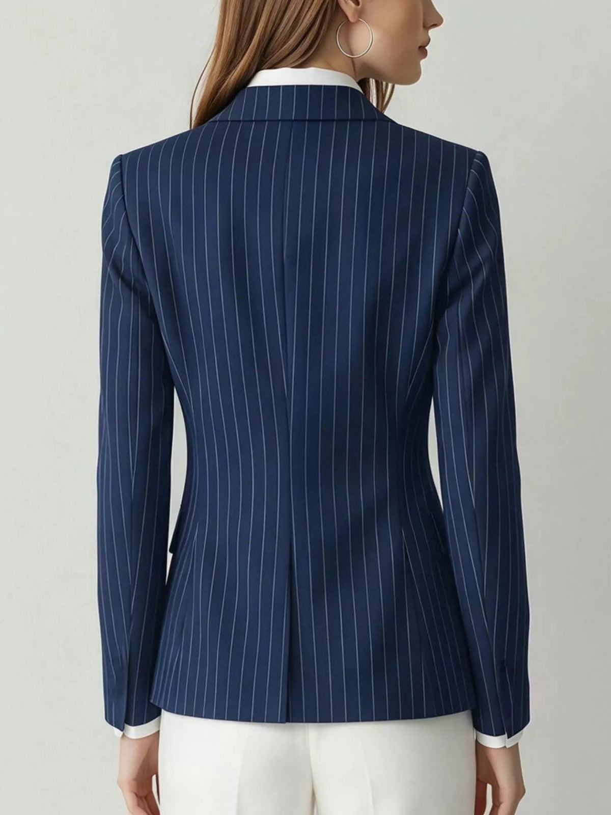 Navy lapel collar one button blazer, back view