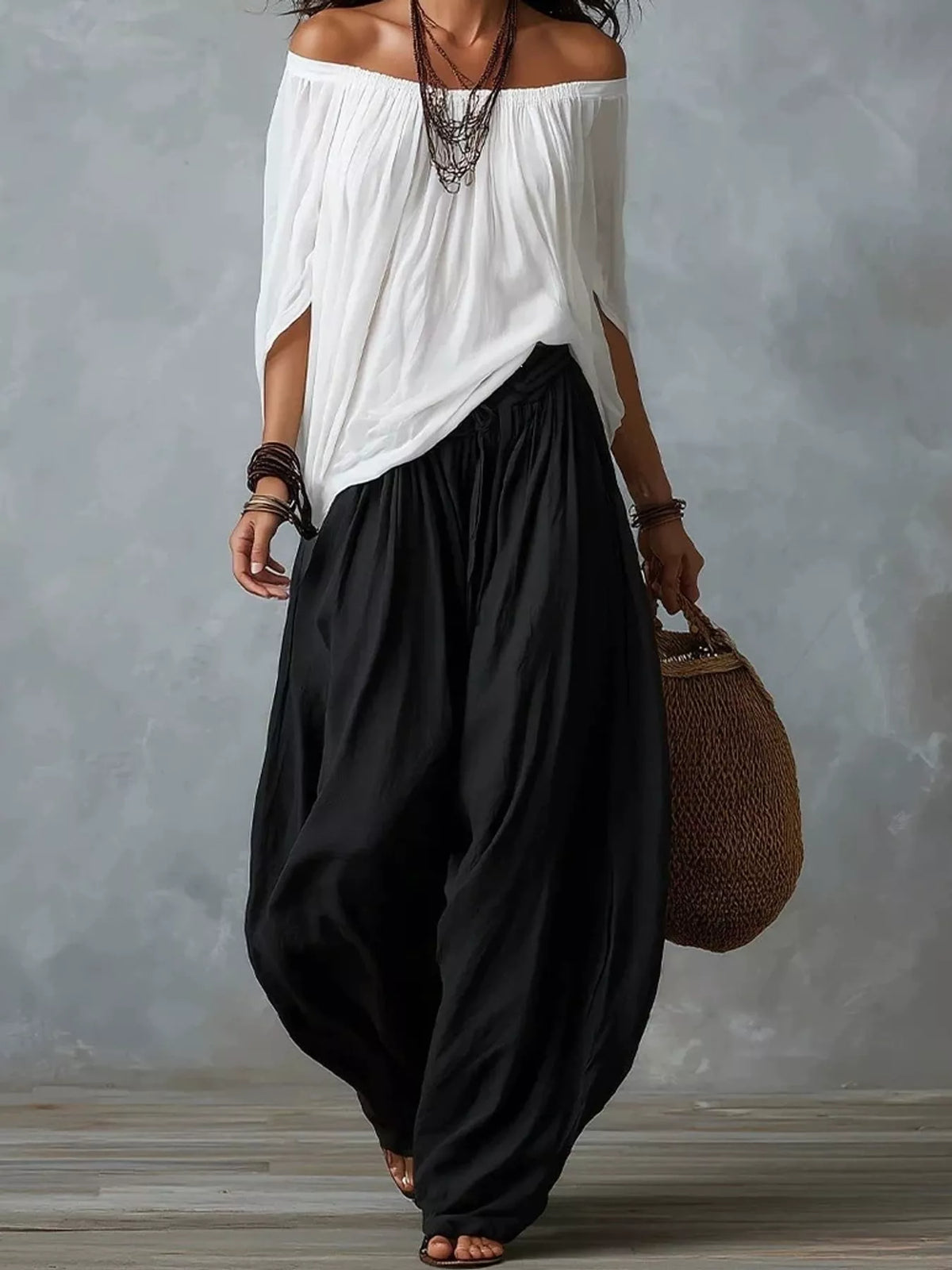 White top and black pants off-shoulder top and wide-leg harem pants set — front view