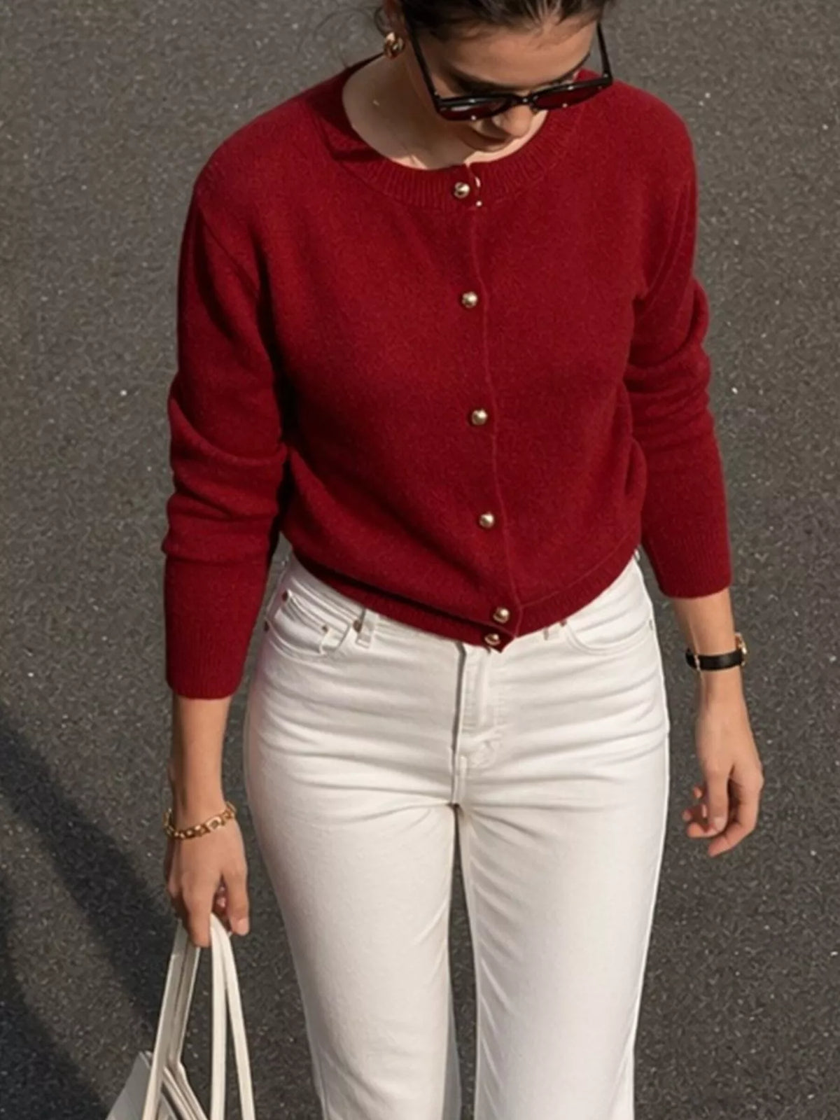 Burgundy round-neck button-front knit cardigan, front view.