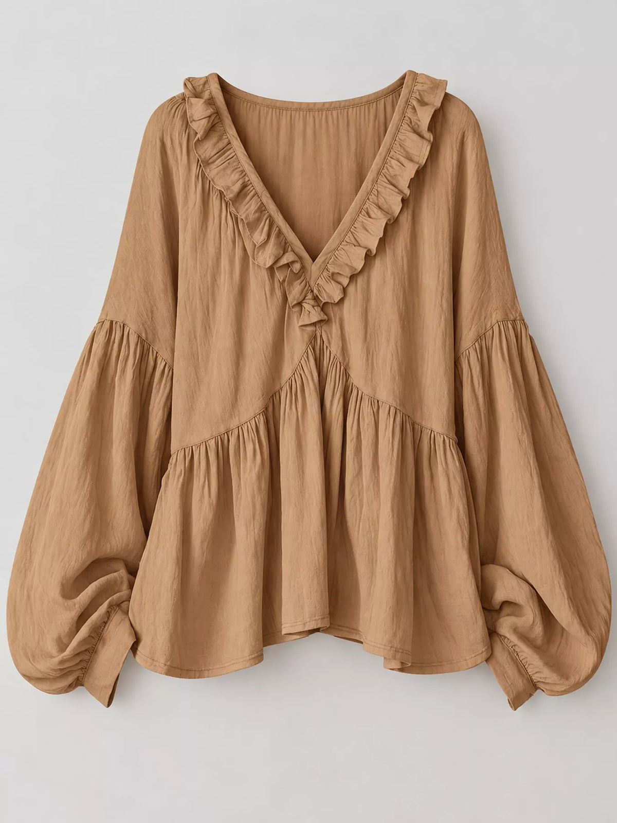 Tan ruffled v neck blouse, front view