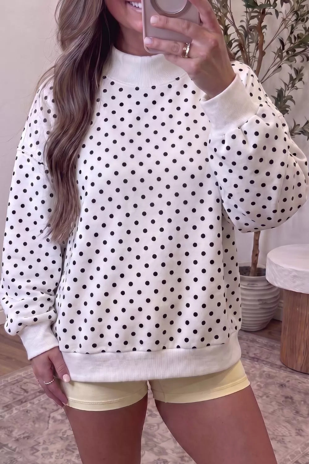 White polka dot mock neck sweatshirt