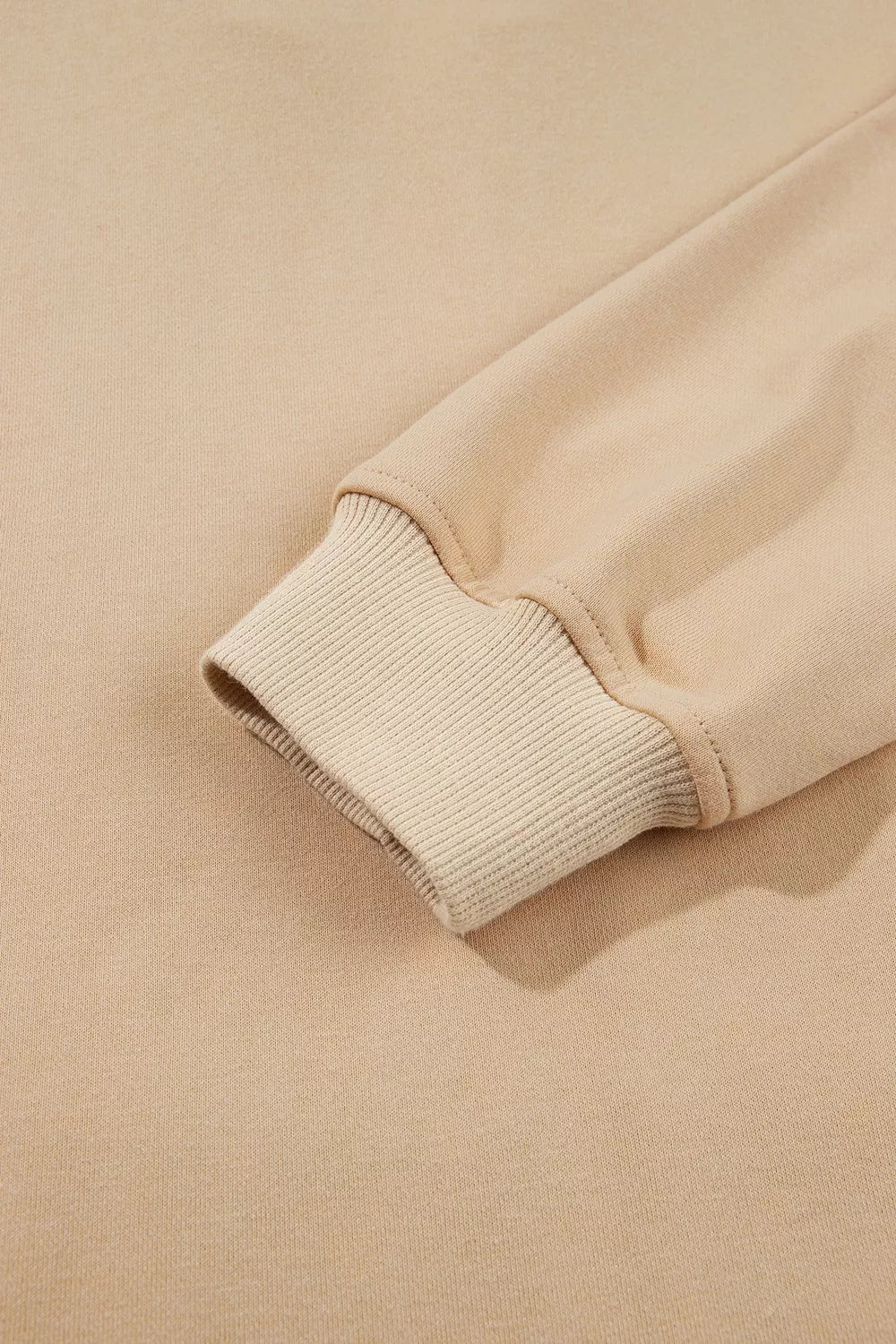 Polka Dot Zip-Up Hoodie in beige, cuff detail