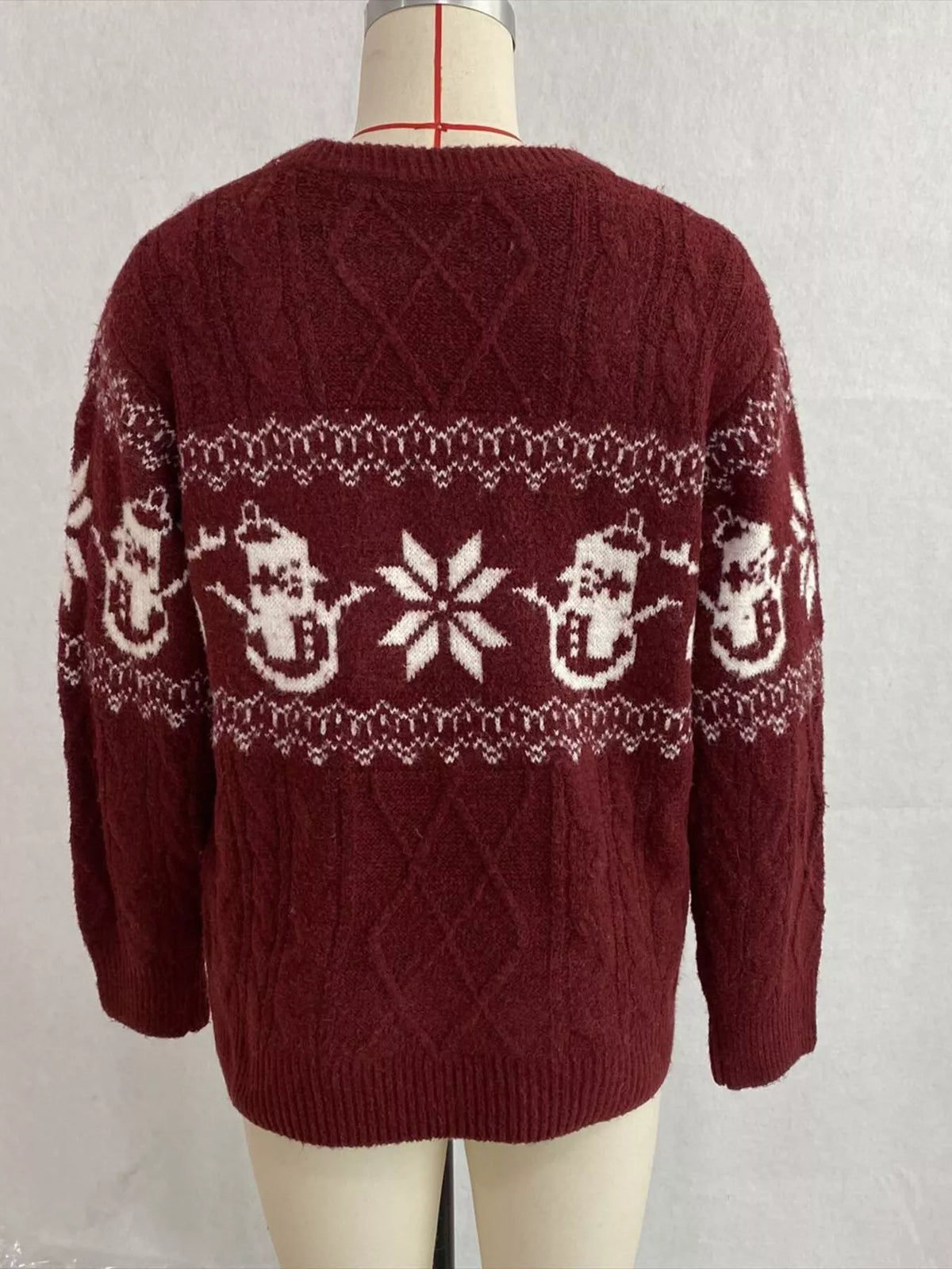 Burgundy christmas snowman cable-knit sweater, back on dress form.