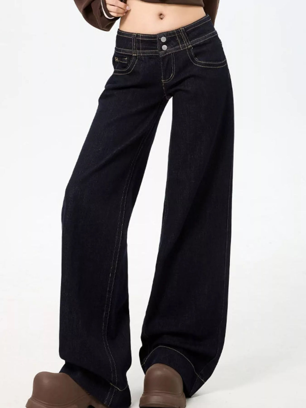Black low-rise wide-leg jeans — front view
