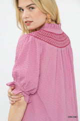 Trendsi Umgee Textured Henley Blouse with Ruffle Cuffs -