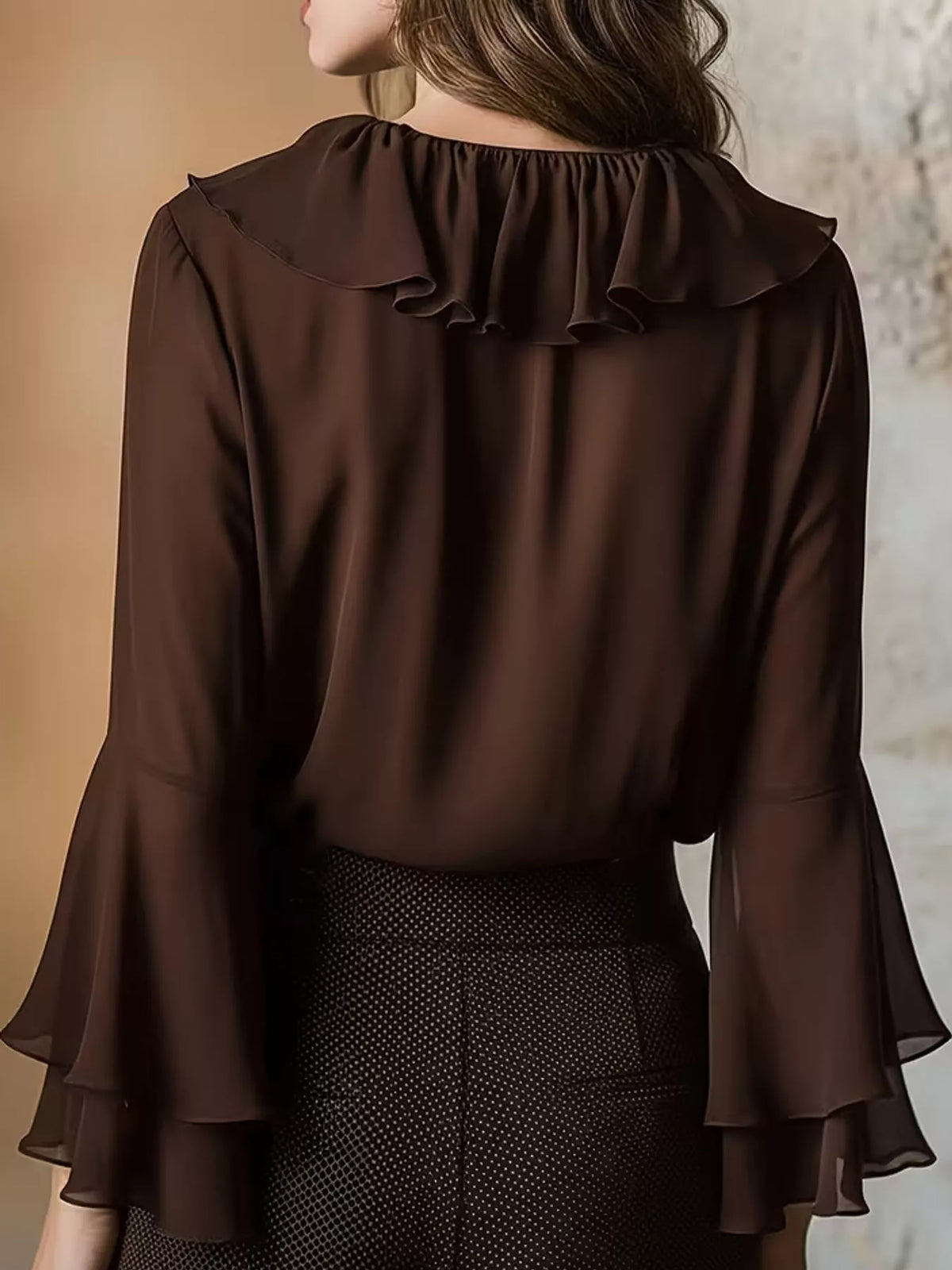 Brown ruffle-trim V-neck blouse with tiered bell sleeves, back view