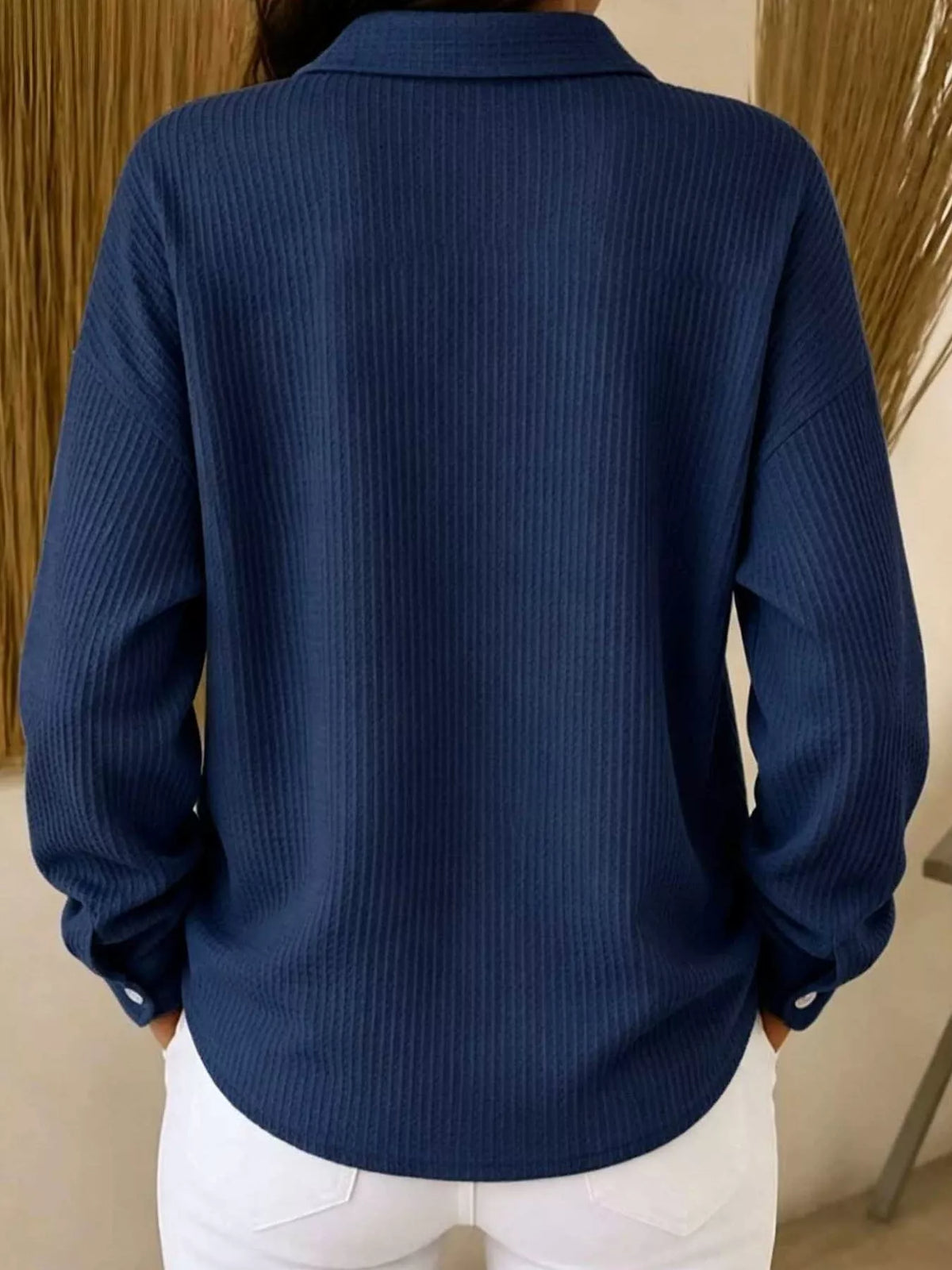 Navy waffle knit button-down shirt, back view