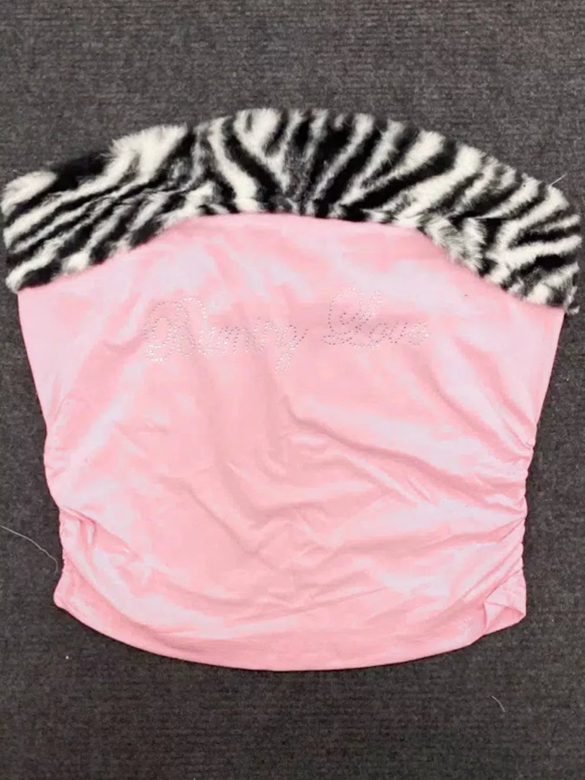 Pink with black-and-white zebra trim animal print faux fur trim tube top, front view