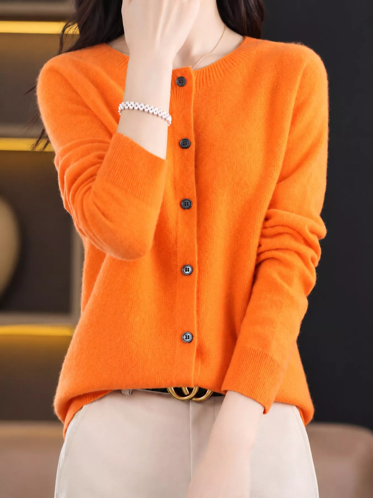 Round neck long sleeve cardigan, front view on model