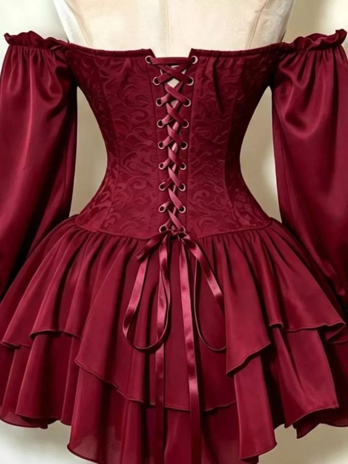 Off-Shoulder Corset Style Ruffle Hem Mini Dress, back view in burgundy