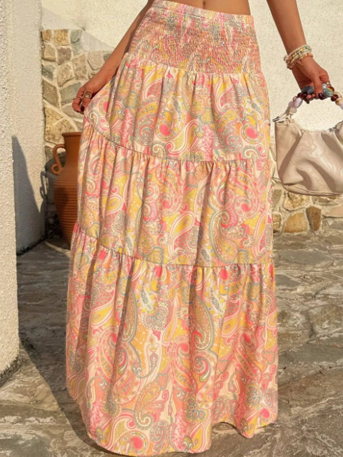 Women's Paisley Print Tiered Maxi Skirt in peach and yellow — front view