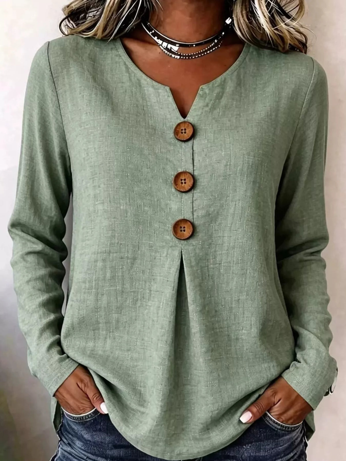 Green long sleeve decorative button blouse