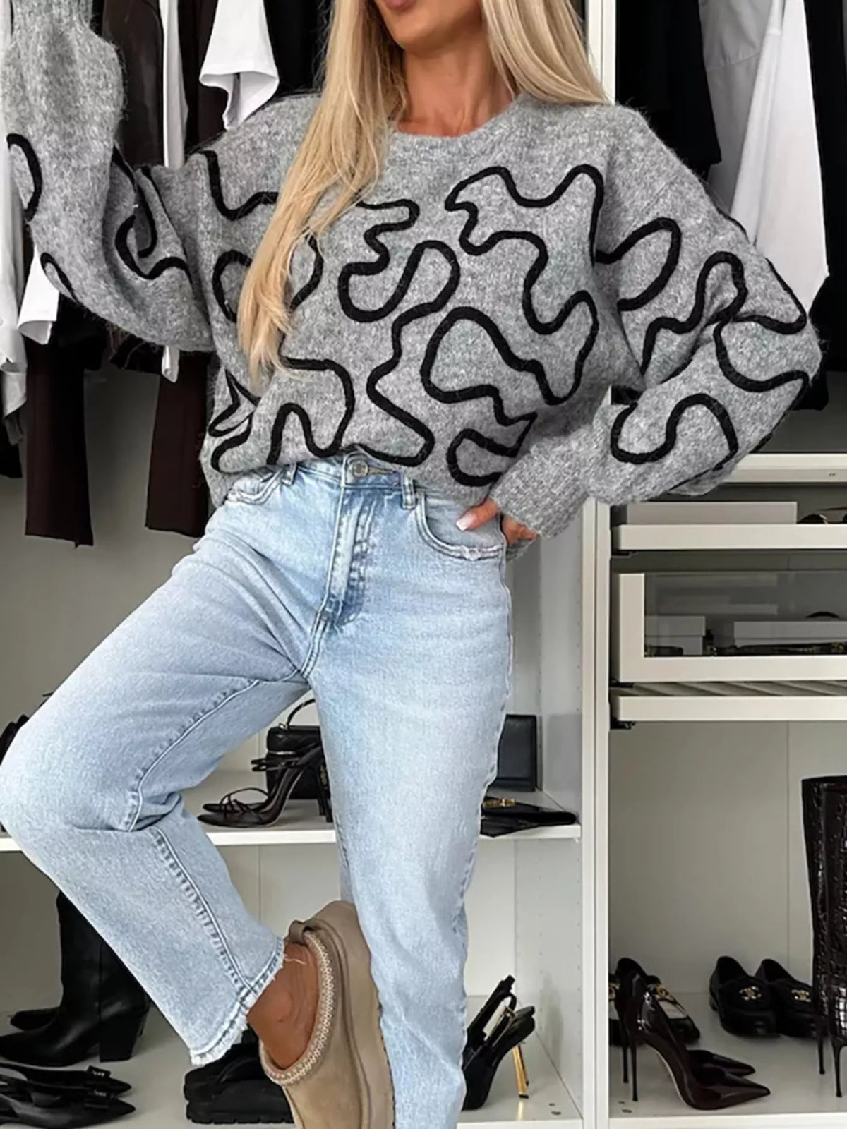 Gray abstract pattern oversized crewneck sweater, full front view.