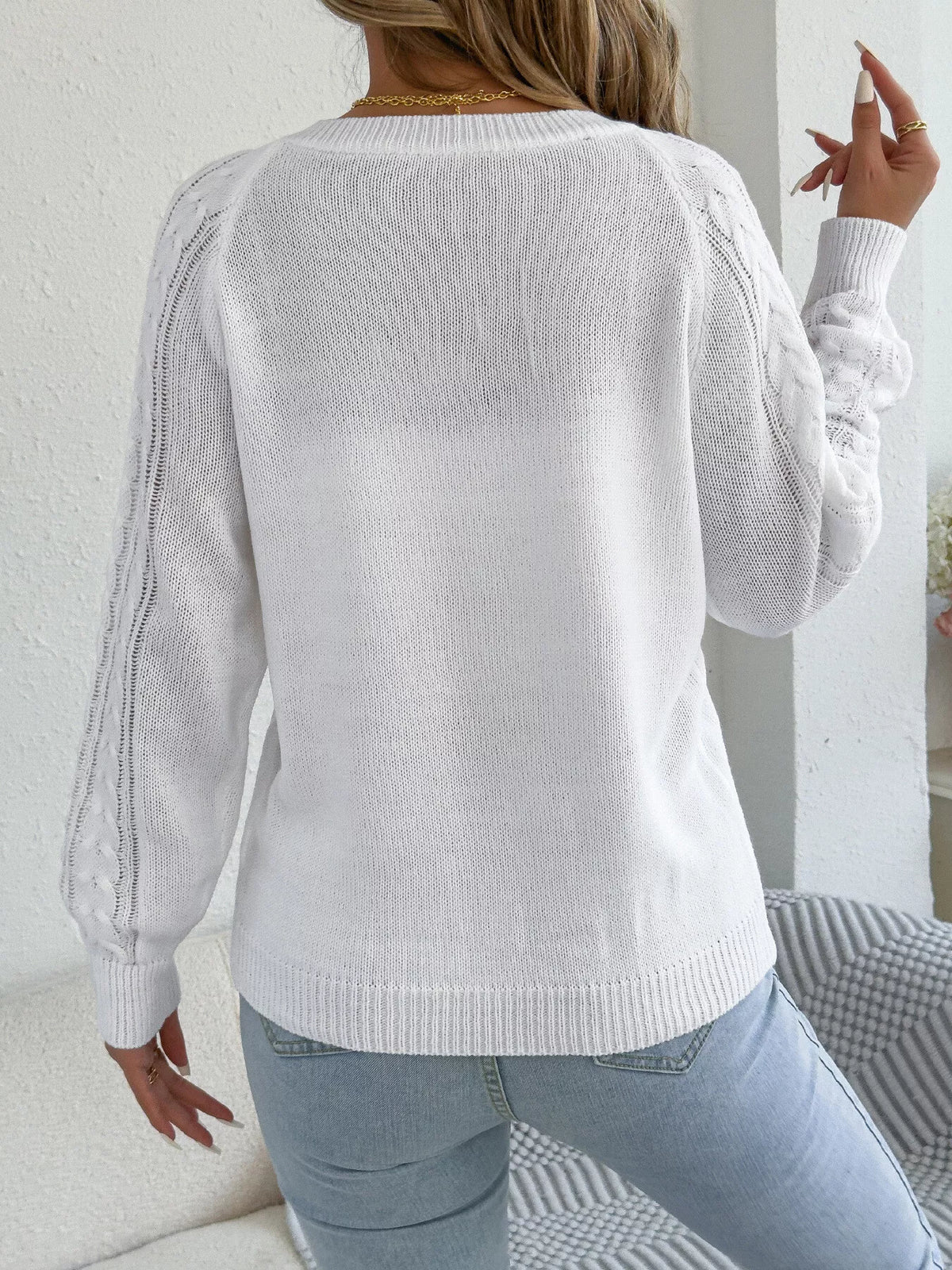 Cable knit button-front cardigan, back view