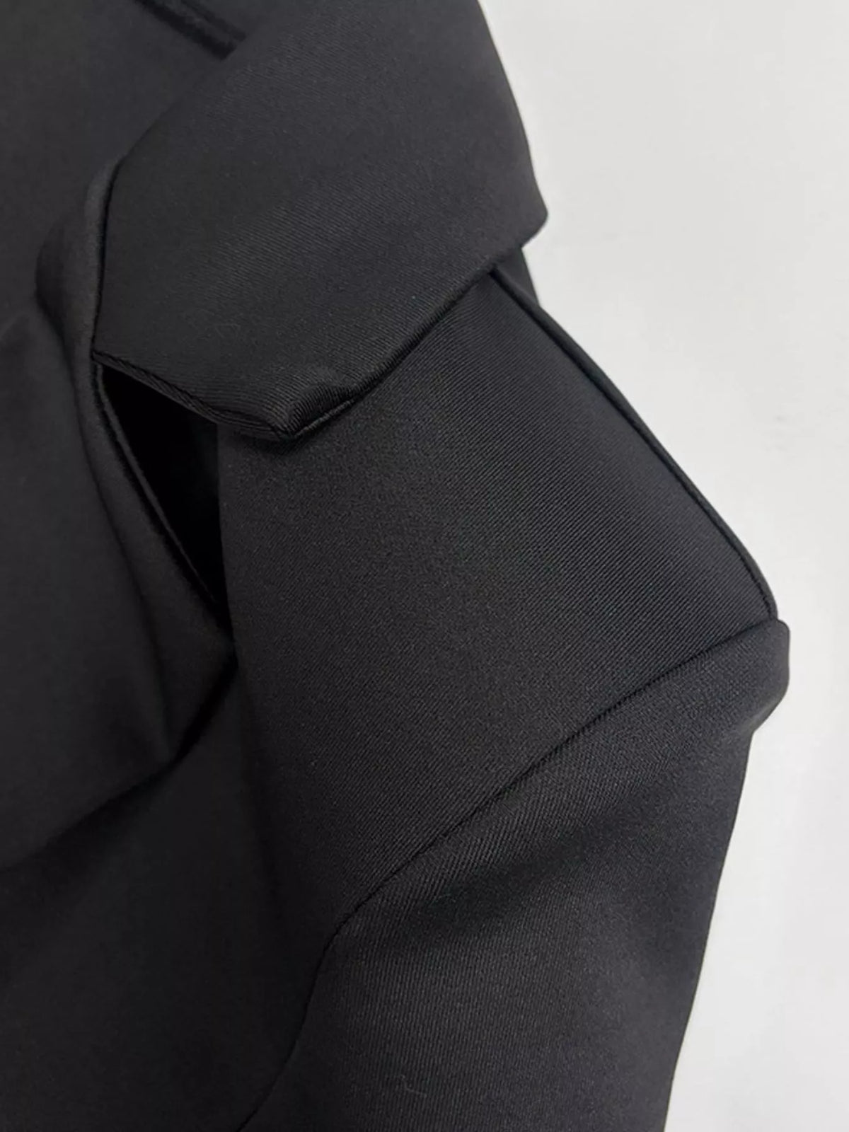 Black double-breasted blazer dress — design and construction details