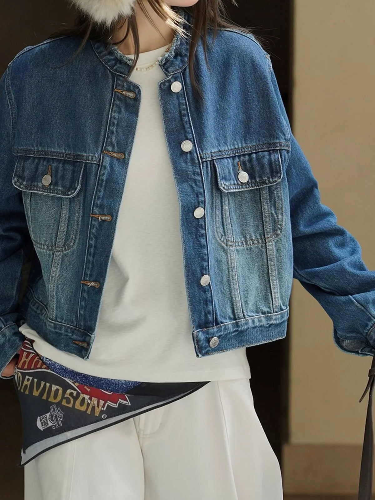Blue button-up cropped denim jacket — design and construction details