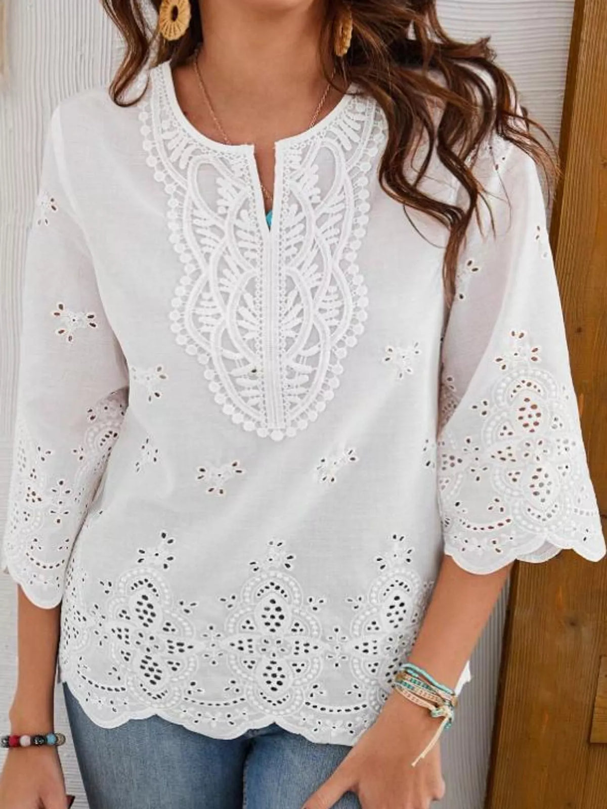 White eyelet embroidered v-neck blouse
