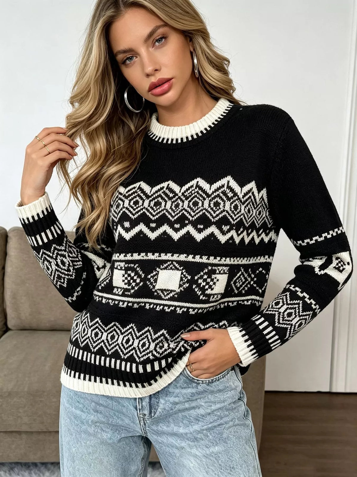 Black and white christmas fair isle crewneck sweater, front view showing geometric band variation.