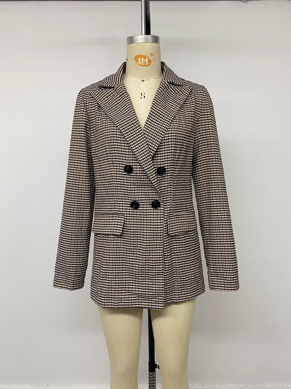 Brown plaid double-breasted blazer, front on mannequin