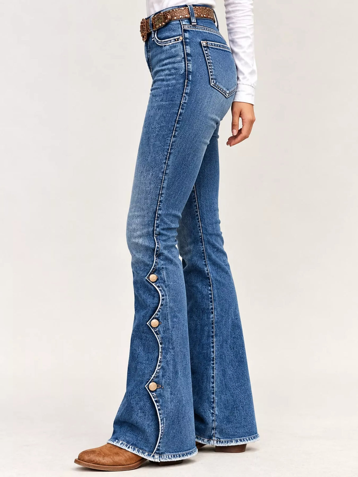 Button-Side Flare Jeans in dark blue, side view
