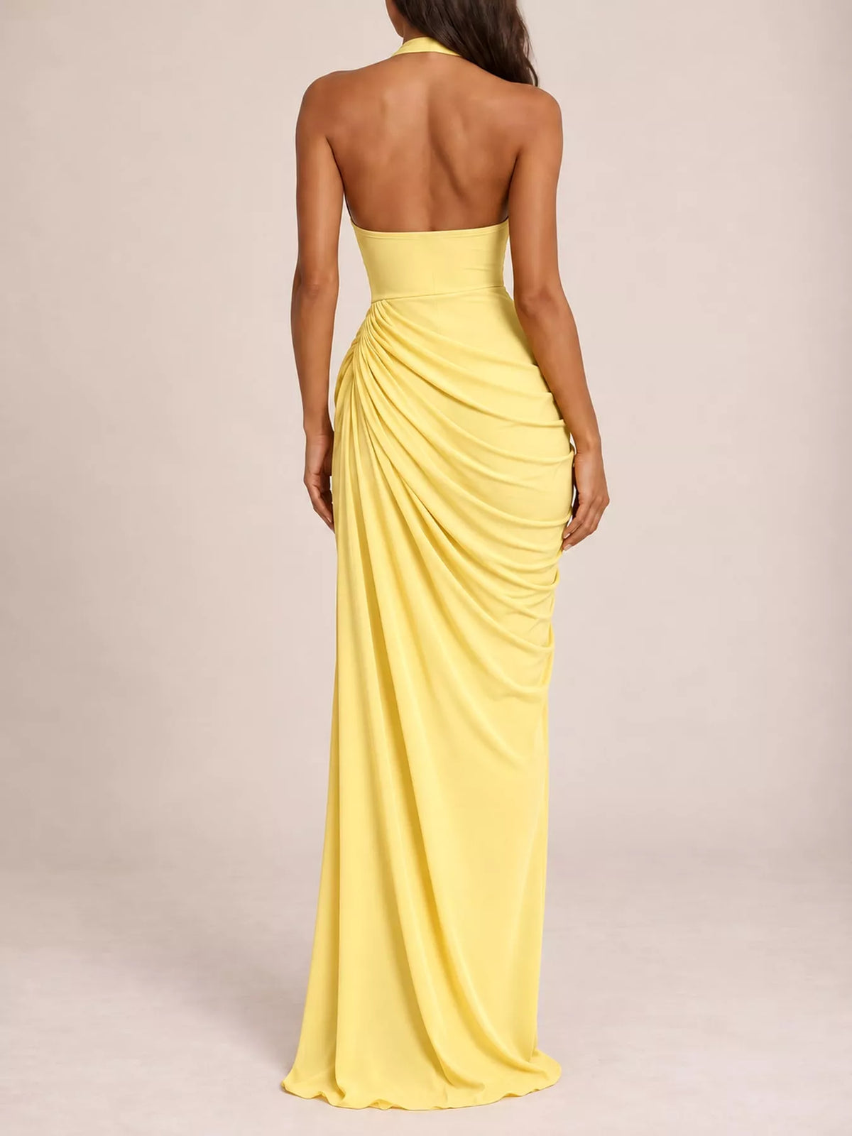 Yellow halter neck high-slit maxi evening dress — back view