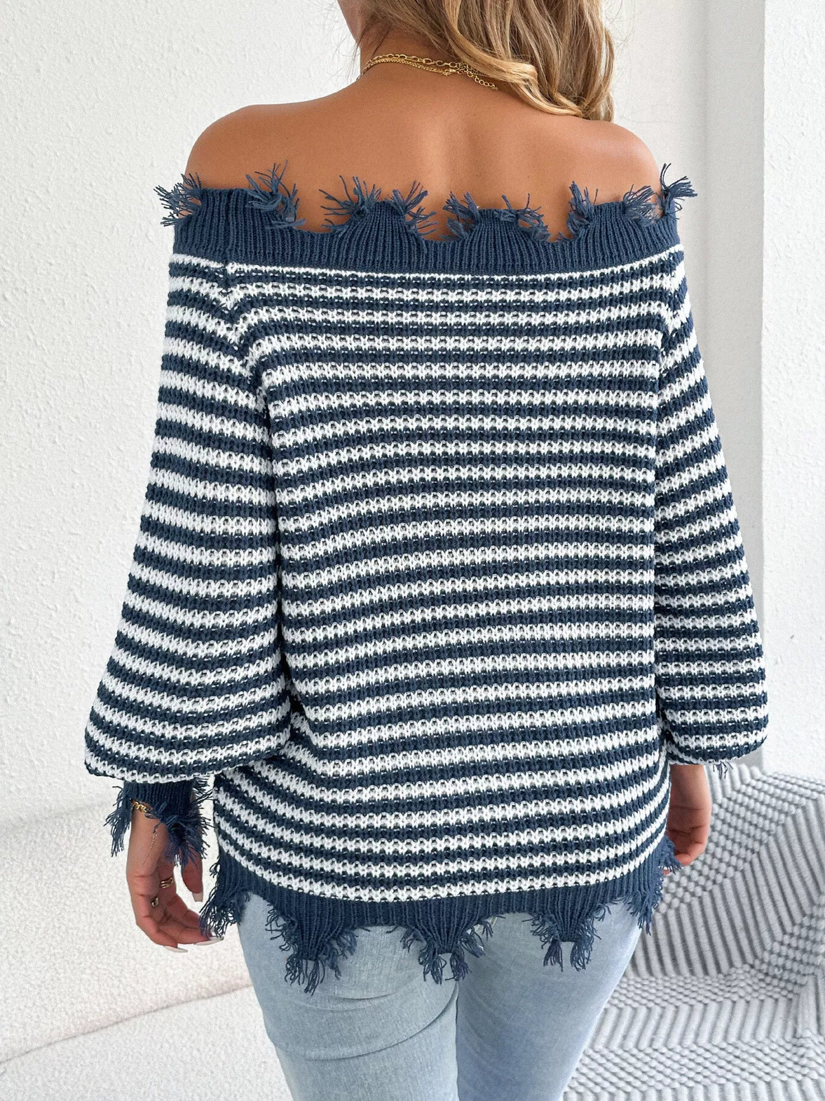 Blue off-shoulder frayed hem striped sweater, back view