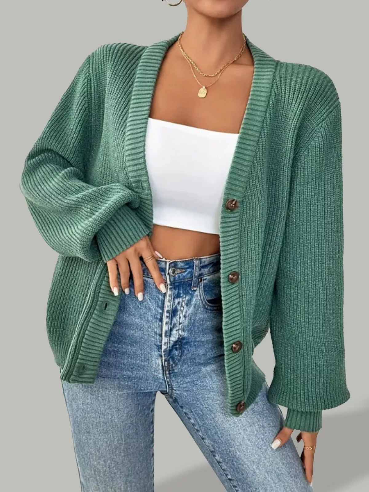 Green v-neck button-front cardigan, front view open.