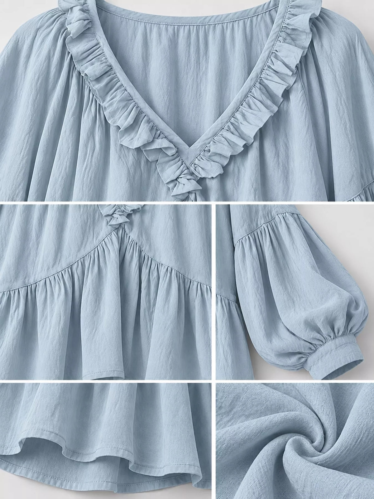 Light blue ruffled v neck blouse, detail view