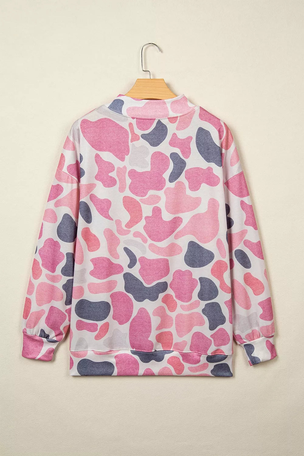 Pink camouflage Howdy sweatshirt, back on hanger