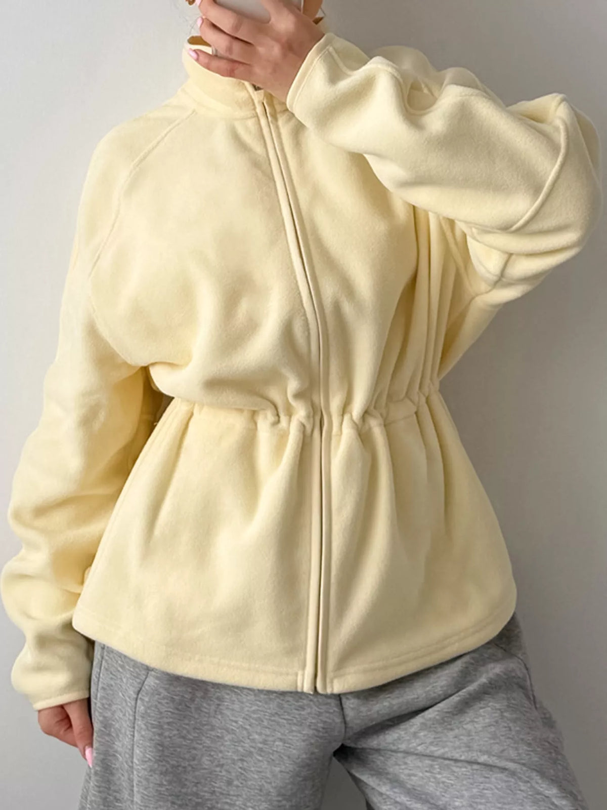 Yellow drawstring fleece zip-up jacket